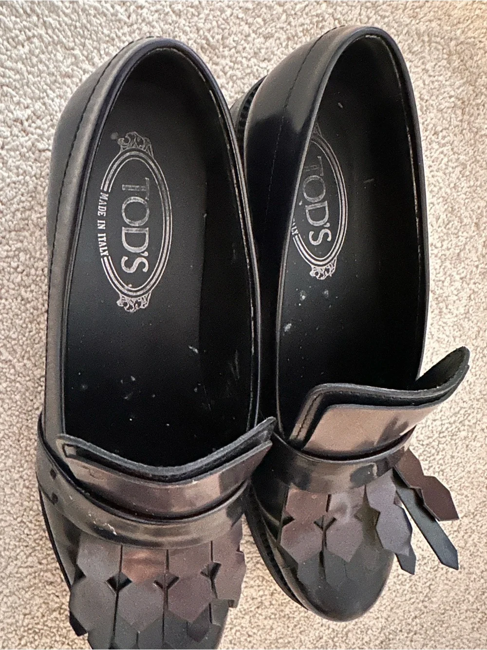 Tod's Black Leather Kiltie Penny Loafers